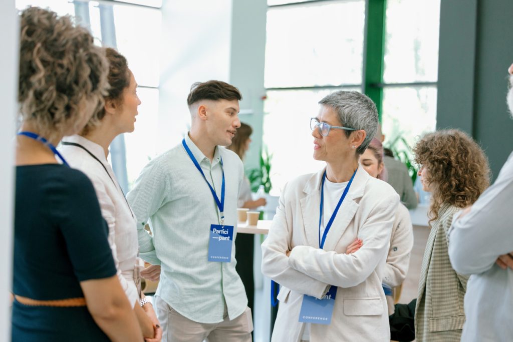 Event attendees network with each other.