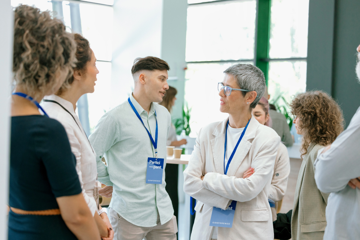 Event attendees network with each other.