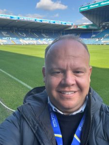 Chris Jackson, the IBM Software Senior Business Development Manager at TD SYNNEX UK, taking a selfie pitchside at Elland Road
